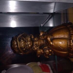 Vintage golden brown patina ceramic girl